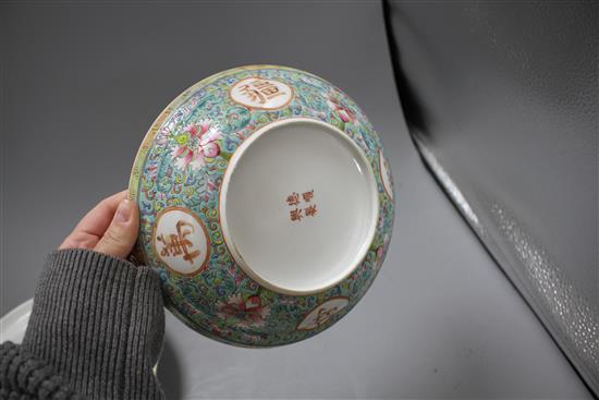 Two graduated Chinese famille rose bowls and cover, 20th century, each decorated with inscriptions and bearing red four character marks